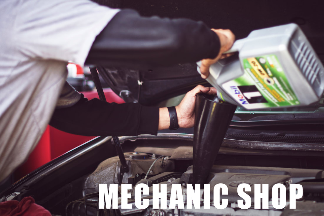 mechanic_shop_pouring_oil